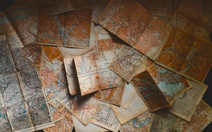 Picture of multiple maps. The career planning process can be like choosing the right map to follow as a template.